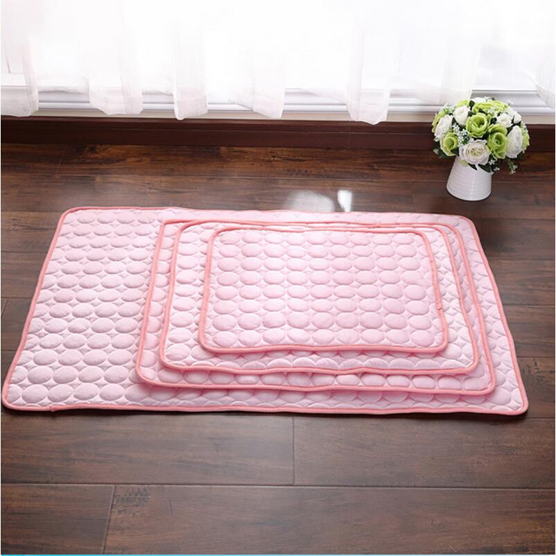 Pet resting on a pink Babecute cooling mat